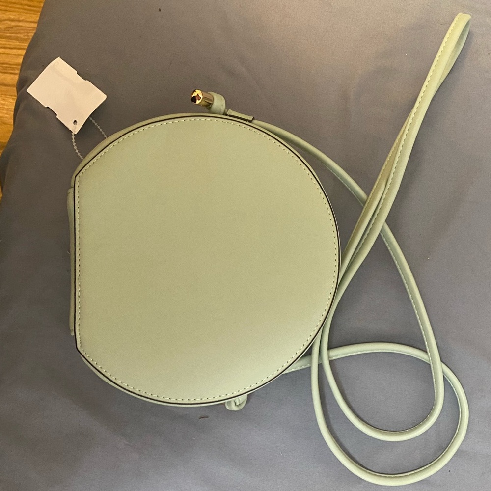 Cute round teal crossbody bag